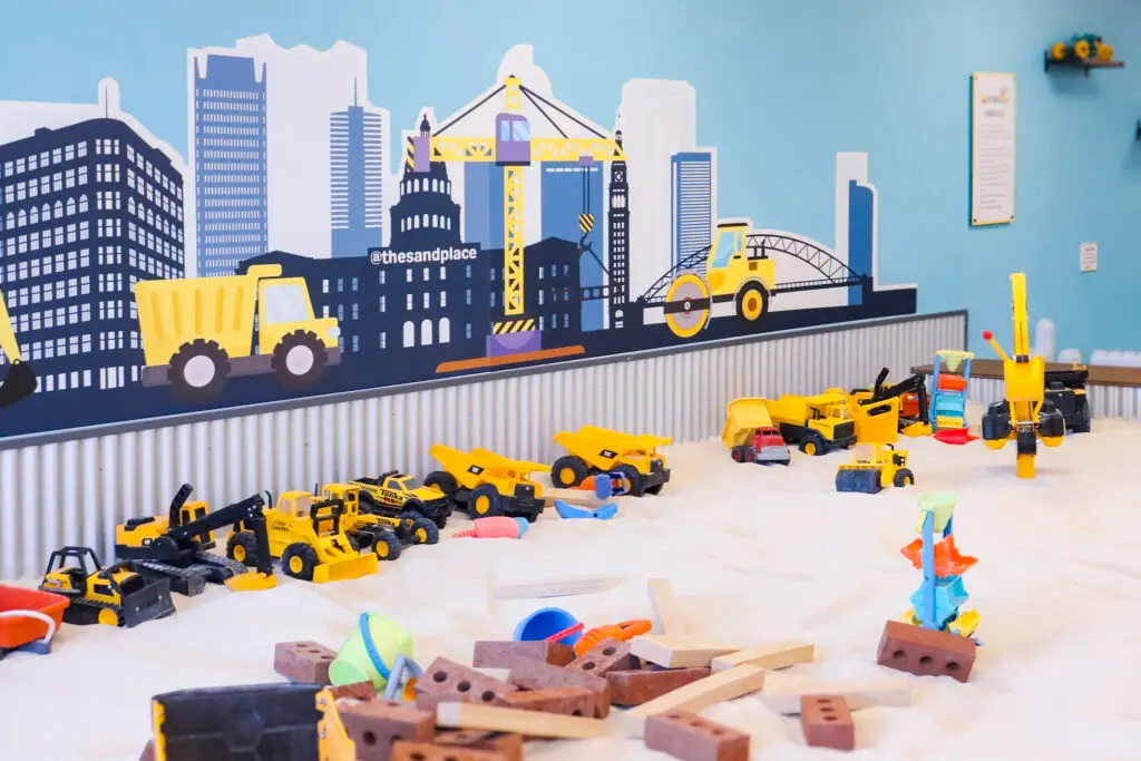 Constructing Joy with Loads of toys at our Indoor Sandbox.