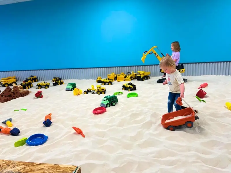 Construction-themed party details showcasing the unique decor and available toy trucks.