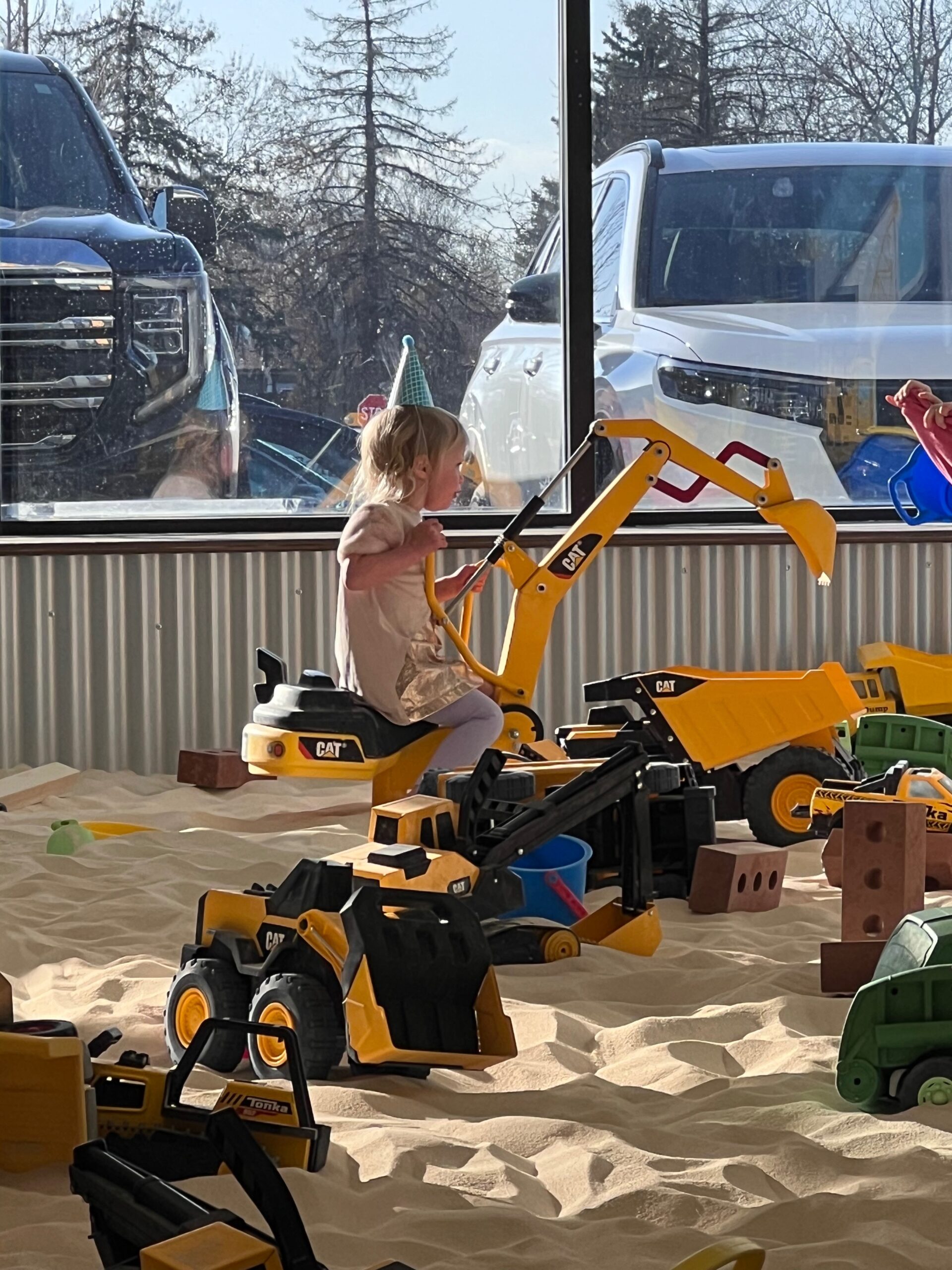 Young children building sand sculptures at The Sand Place Aurora Colorado