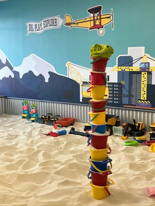 Birthday party kids with sand toys at The Sand Place indoor playground
