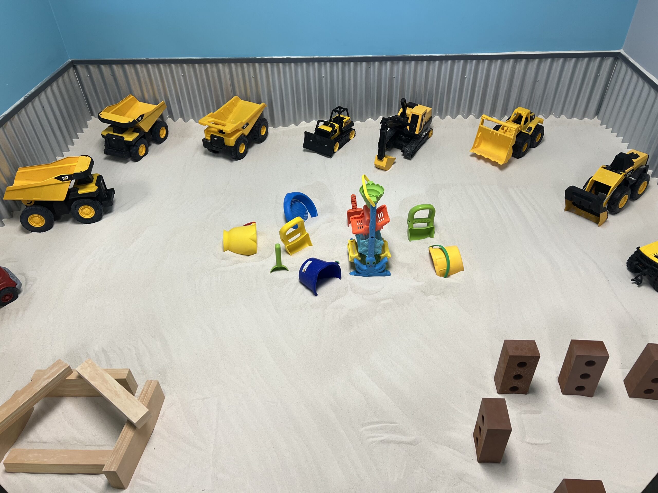 Small sensory friendly sandbox designed for children with autism and sensory sensitivities