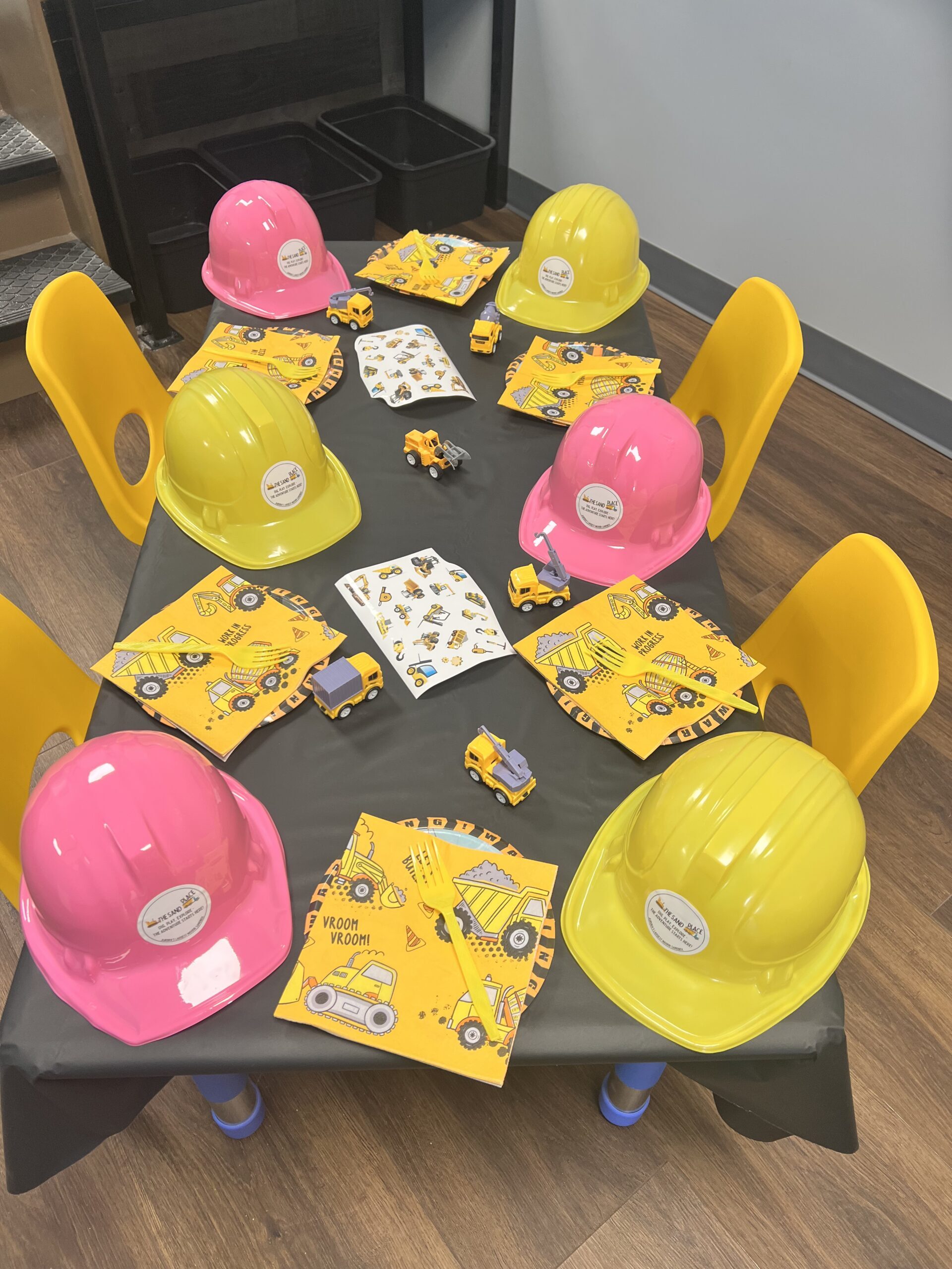 Birthday party table setup with themed decorations at Aurora’s indoor sandbox venue