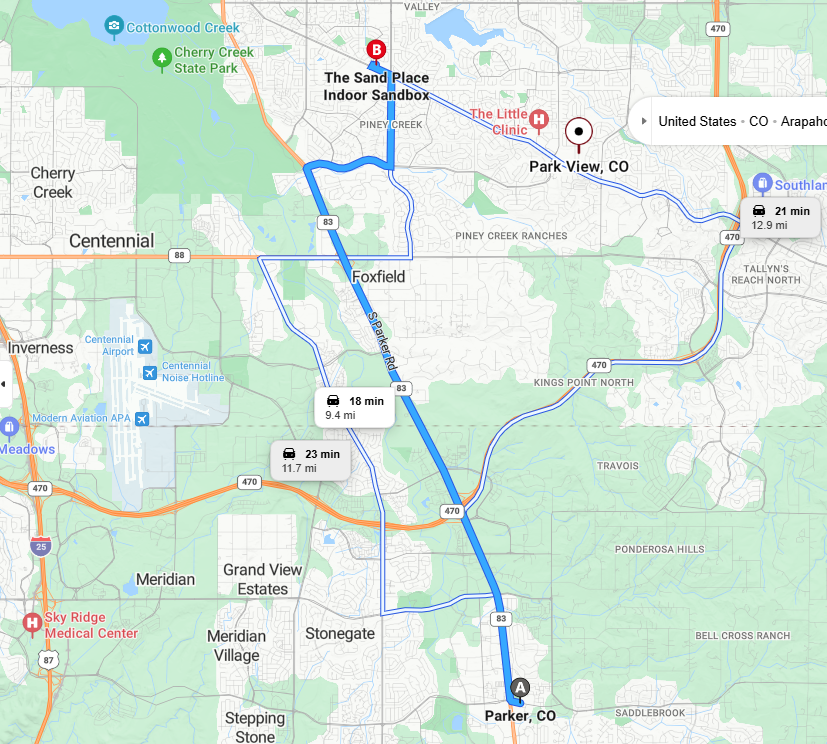 Simplified illustrated map showing driving route from Parker, CO to The Sand Place Indoor Sandbox in Park View, CO, with landmarks and playful icons.